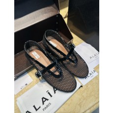 알라이아 Alaia Ballet Flats in Fishnet Black