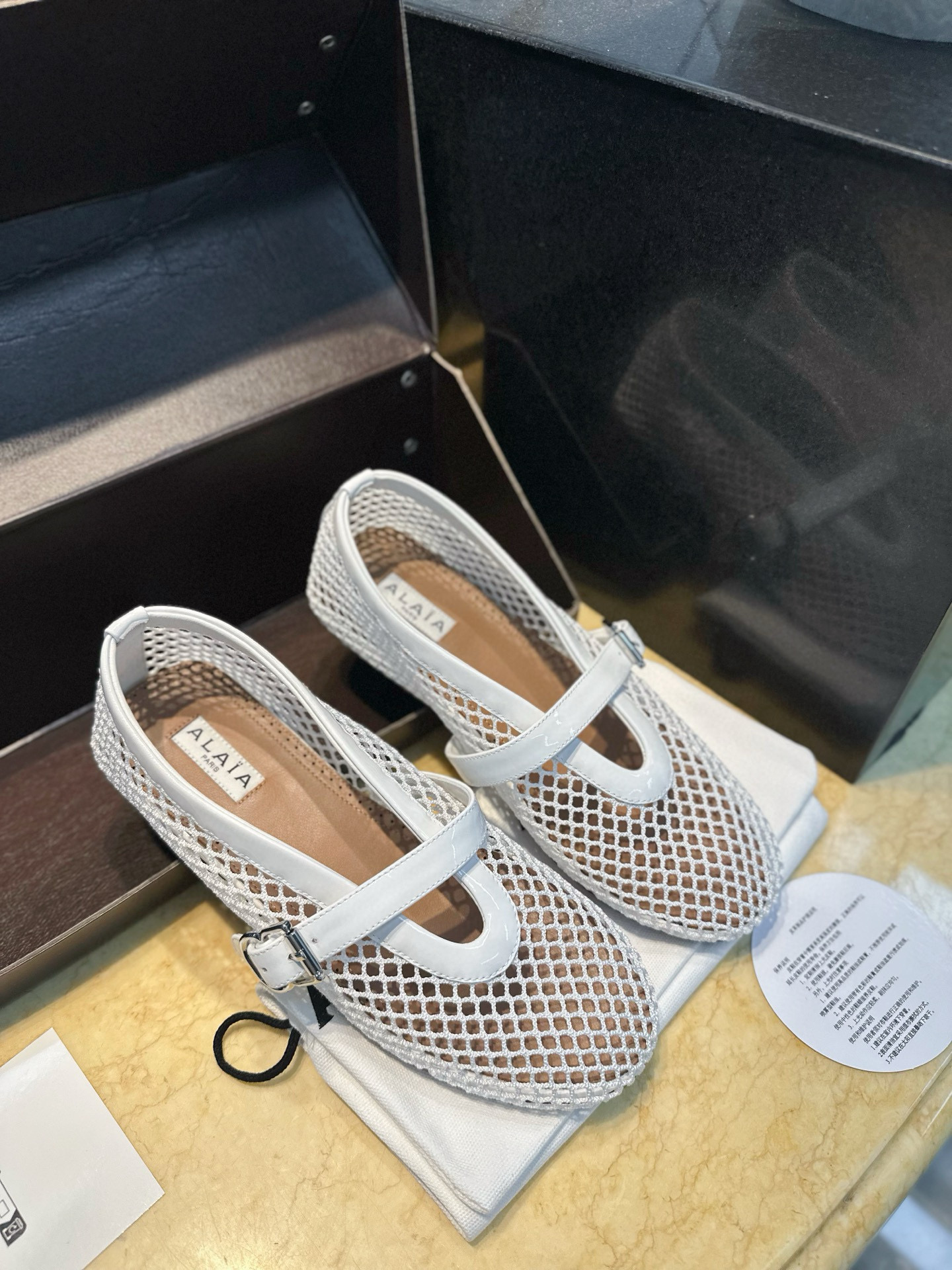 알라이아 Alaia Ballet Flats in Fishnet White
