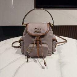 미우 미우 Miu Miu 5BZ043 캔버스 및 가죽 백팩 Aluminum Brandy 18cm